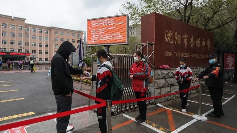 Chinese city quarantines thousands over new COVID-19 cluster