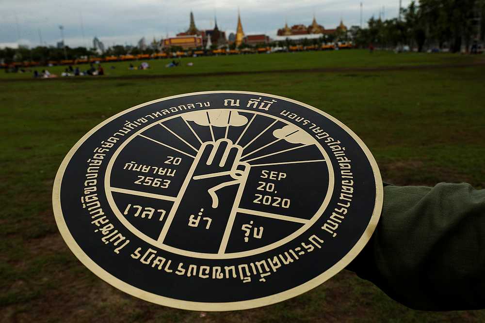 Thai protesters’ plaque challenging monarchy removed from near palace