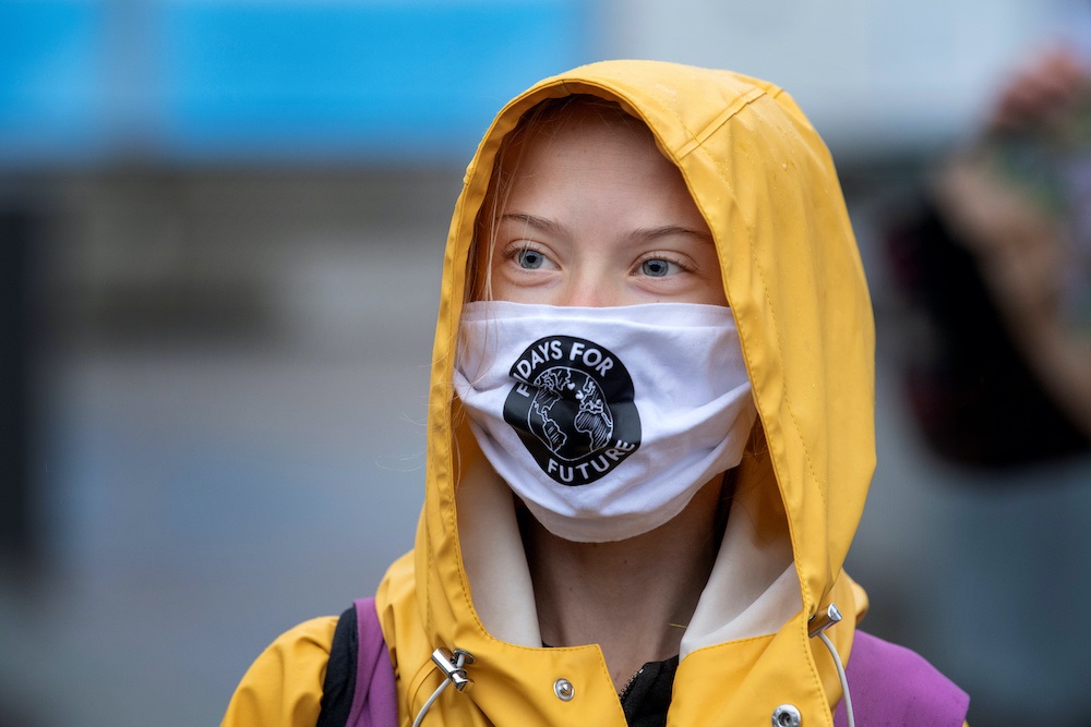 Climate activist Greta Thunberg shows support for Biden in rare political tweet