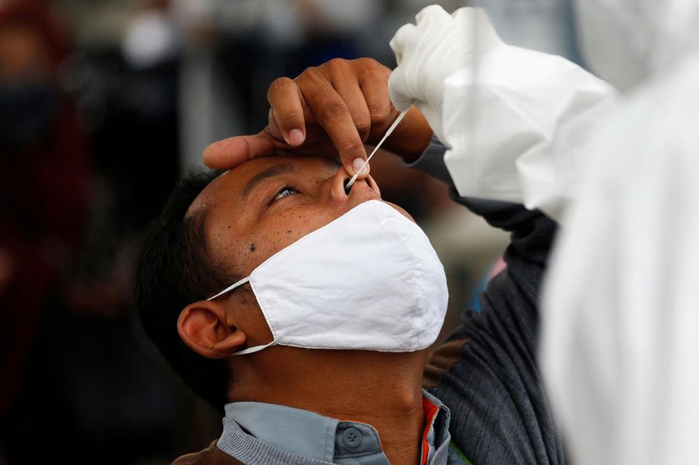 Indonesia reports record daily rise in coronavirus infections