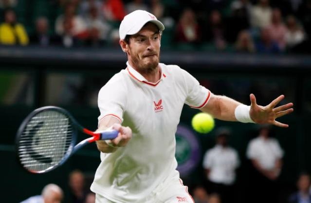 Tennis: Murray survives big wobble to make winning return at Wimbledon