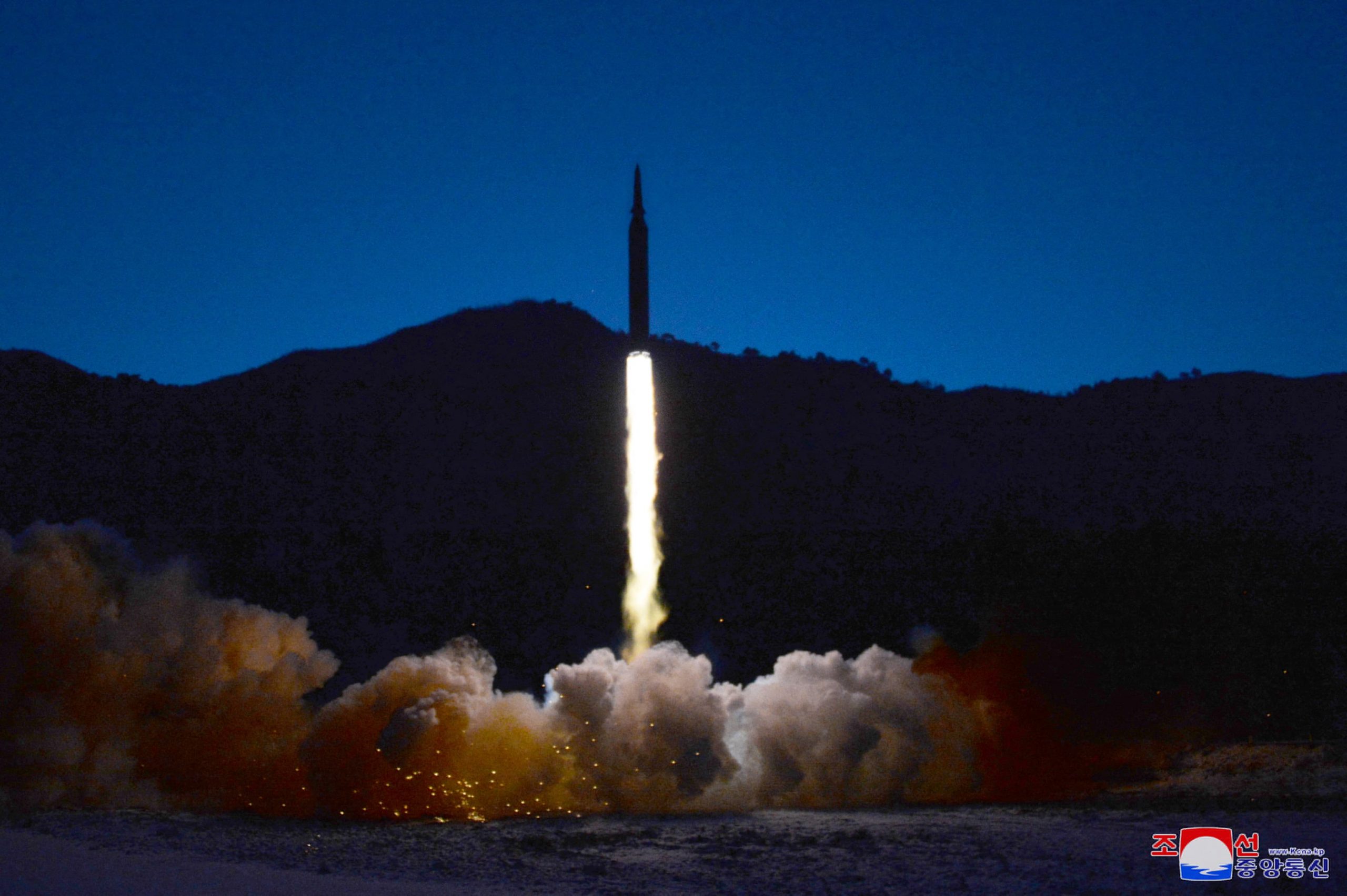 N.Korea fires two missiles, warns of action over US sanctions push