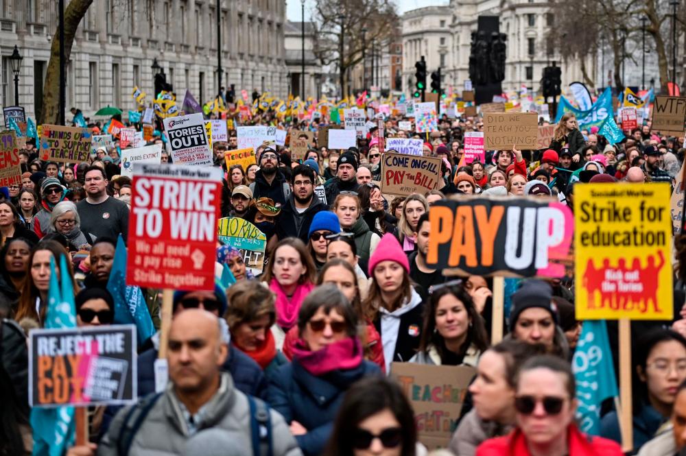 Half a million strike in UK as cost-of-living crisis bites