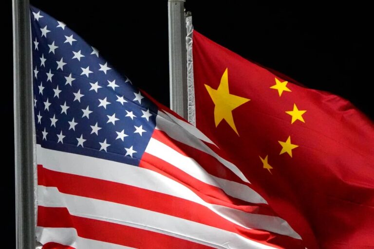 US, China top military officials speak for first time in over a year