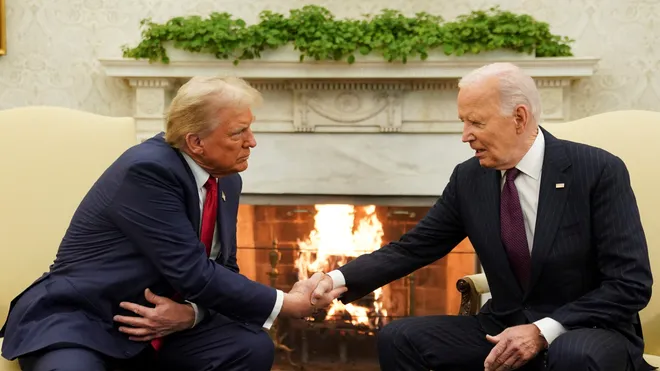 Trump and Biden’s White House reunion: Trump leans in, locking eyes as Biden looks down